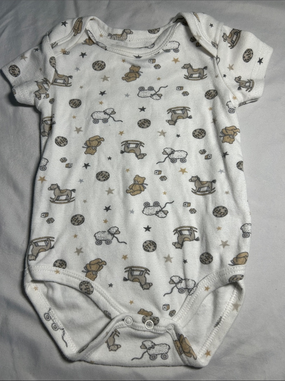 Little & Loved White Baby Onesie with Toy Print